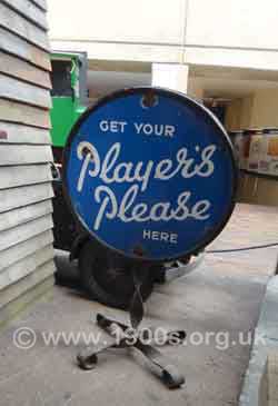 Old moveable cigarette advert stand for pavement