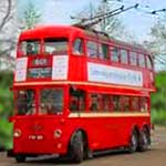 trolley bus showing its two trolly pole connectors to overhead power lines