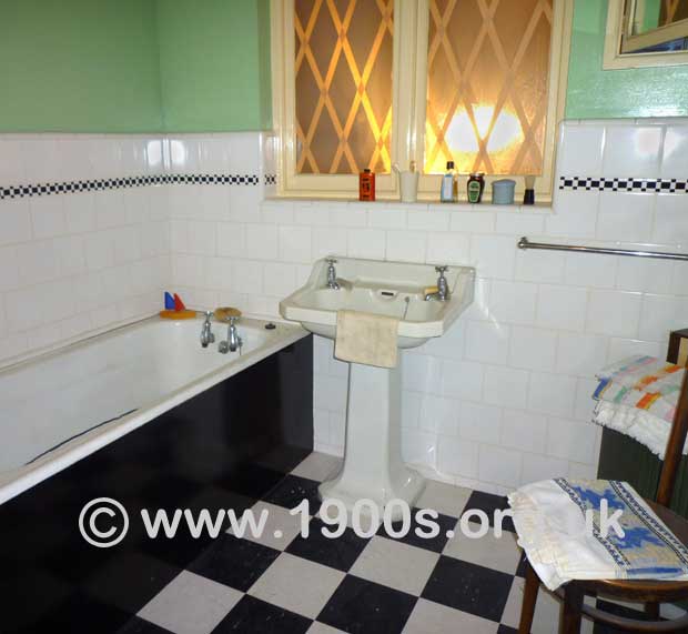 Black and white lino tiles, which seemed to be on the floor of every bathroom of houses built in the 1930s UK, thumbnail