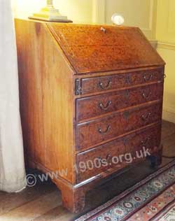 Closed  bureau - showing the writing surface and storage compartments