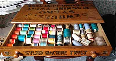 open top drawer of sewing display box