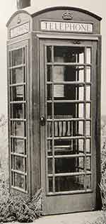 Full set of telephone directories in a telephone box