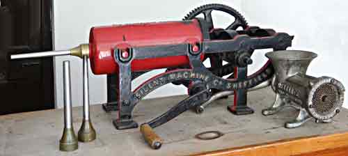 Old sausage-making machine as used in the early 1900s when it would have been on display on the counter of a butche's shop