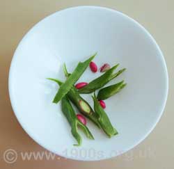 Runner bean cross sliced by a knife